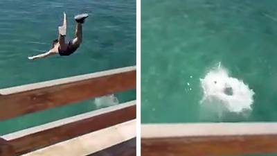 Un jeune saute d'un pont sans regarder